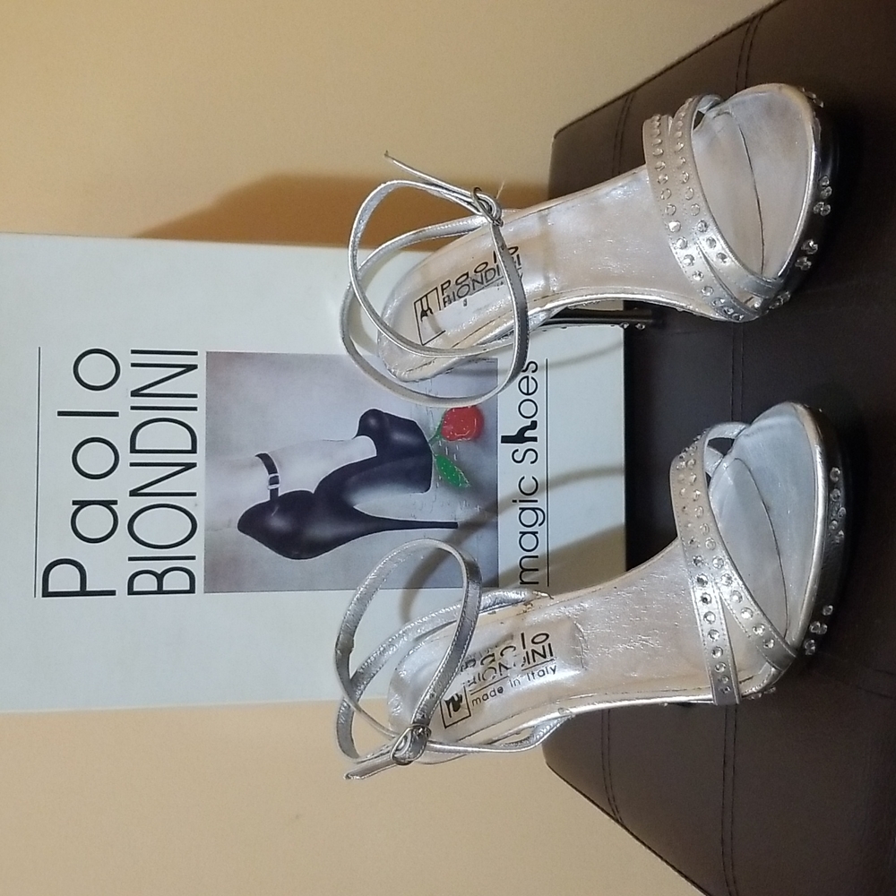 Sexy, silver jeweled, ankle strapped shoe.